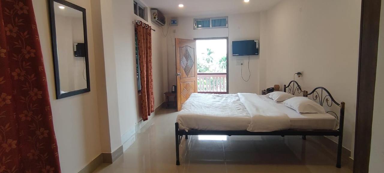 Hilltop Lodge Guwahati Habitación foto